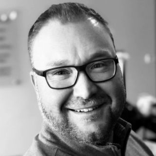 Black and white photo of Joshua Robinson